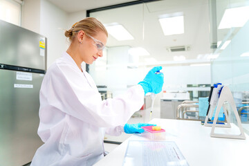 Scientist conducts analysis in modern laboratory focused on research and experimentation