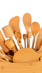 Assortment of Wooden Kitchen Utensils isolated on white. Vertical photo.