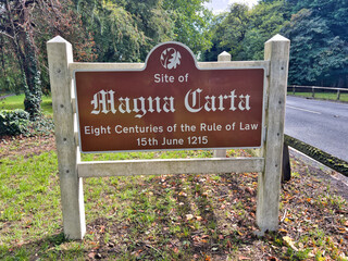 Signpost marking the site where the Magna Carta was signed in 1215 at Runnymede, Surrey, UK