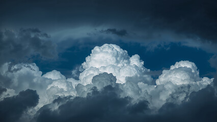 Majestic Clouds Illuminated by Warm Light and Shadows