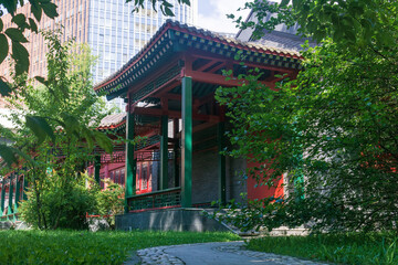 Chinese traditional architecture on a background of a modern office builings