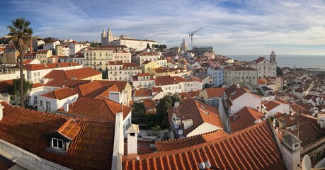 Panoramic view of rooftops, buildings and coast of Lisbon, Portugal, December 2018