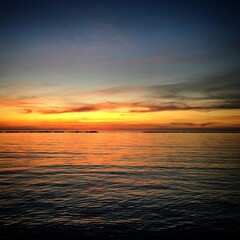 Serene sunset over the water of the Mediterranean Sea from Geroskipou, Paphos, Cyprus, October 2018