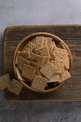 Crackers and Crispbreads in Wooden Bowl