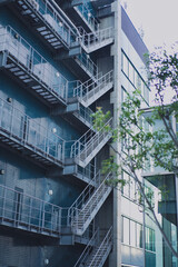 A tall building with a bunch of stairs