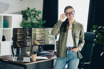 Young professional programmer working in modern office, showcasing expertise and innovation in software development