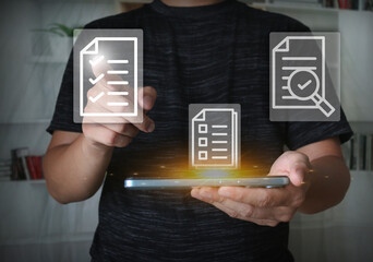 Businessman using smartphone with digital checklist and document icons for online task management