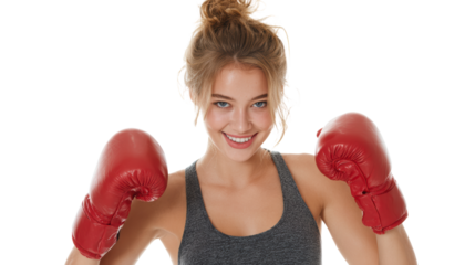 Smiling woman wearing boxing gloves, ready to train and compete, isolated on a white background.