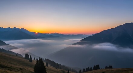 Majestic mountain valley blanketed in ethereal fog at sunrise with golden sky.