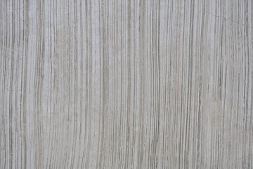 concrete road surface with etched grooves to prevent slipping, providing better traction and safety for vehicles and pedestrians