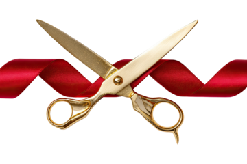 Golden scissors cutting a red ribbon