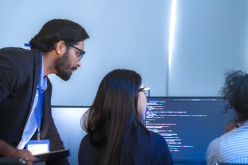 An AI development team collaborates on a project. A senior machine learning engineer mentors his...