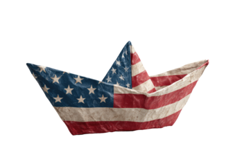 A crumpled origami boat, crafted from a weathered US flag