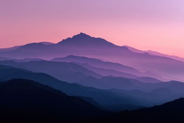 Fototapeta premium Misty mountain range at dawn