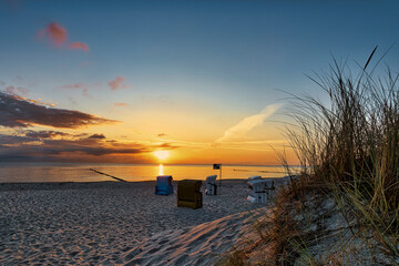 Fototapeta premium Sound of the Sea - Usedom Baltic Sea Vacation Holidays Sunset Beach Chair Relaxation Time-out Travel Cloud Island Postcard Background Wallpaper Beautiful Peaceful North Journey Destination