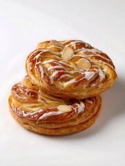 Fototapeta premium Indulge in delicious almond pastries with sweet icing