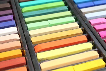 Set of colorful chalk pastels as background, closeup