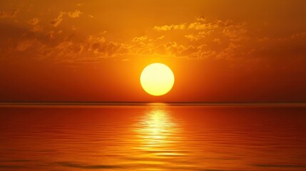 Serene sunset over calm water with warm orange and yellow hues, scattered clouds reflecting light,