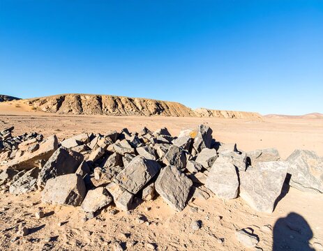 Desert landscape with scattered rocks