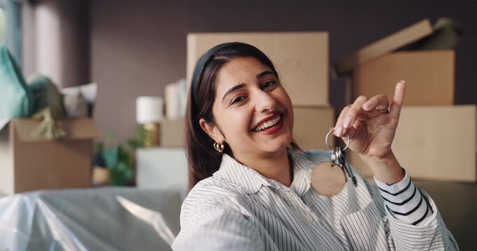 New home, video call and woman with keys, boxes and showing with real estate, influencer or mortgage. Live streaming, property owner or person with achievement, investment or moving in with recording