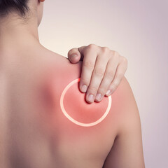 Photorealistic medical illustration of shoulder pain with X-ray overlay and a hand touching the affected area