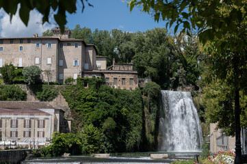 Fototapeta premium The Cascata Grande is formed by the left arm of the Liri River and is approximately 27 meters high:one of the few waterfalls to be found in the historic center of a city, unique in Italy and in Europe
