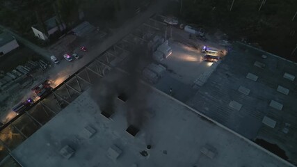 Police and firefighters teamwork at night. Night life in a criminal city. Police cars and fire trucks with in the dark. Joint operation of rescue services 911. Fire extinguishing, emergency situation