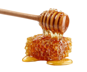 Honeycomb with dripping honey and wooden dipper