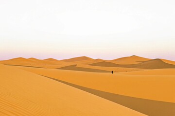 Fototapeta premium Vast Desert Dunes Under a Fading Sky with a Lone Figure Walking in the Distance