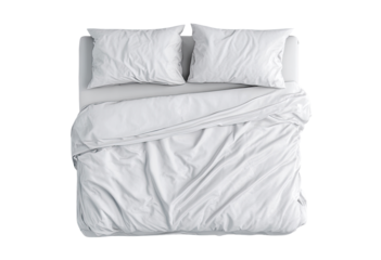 Elevated view of a white bed with draped linens