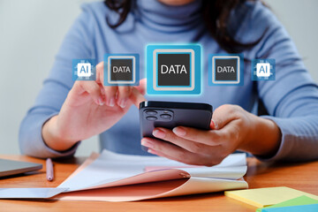 Person using smartphone with data and AI symbols on the screen, illustrating technology, innovation, and modern communication methods in a professional environment