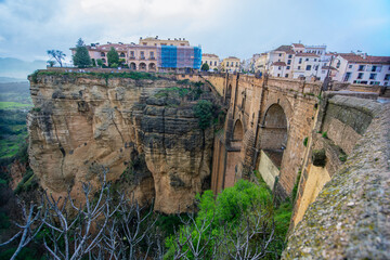 The historic Puente Nuevo bridge in Ronda Spain with its stone arches spanning the massive El Tajo...