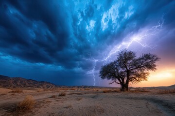 Dramatic lightning strike illuminates lone tree under stormy sky at sunset