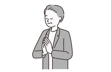 合掌する年配の男性
