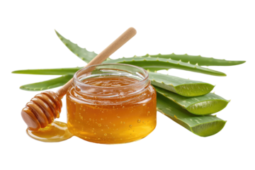 Honey and aloe vera in a glass jar.  Fresh, natural ingredients.  Wooden honey dipper.  Healthy, skin care concept