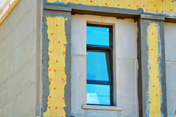 Building facade thermal insulation with mineral wool panels, wall repair and energy saving...