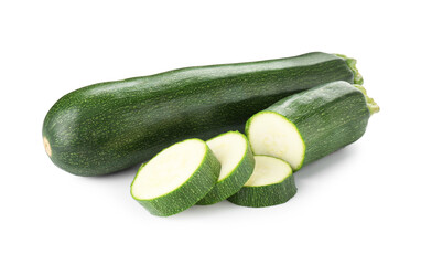 Whole and cut fresh zucchinis isolated on white