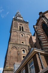 Amsterdam Old Church (Oude Kerk), oldest parish church, founded in 1213. Oude Kerk stands in Amsterdam De Wallen district on Old Church's Square (Oudekerksplein). Amsterdam, The Netherlands.