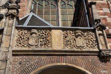 Amsterdam Old Church (Oude Kerk), oldest parish church, founded in 1213. Oude Kerk stands in Amsterdam De Wallen district on Old Church's Square (Oudekerksplein). Amsterdam, The Netherlands.