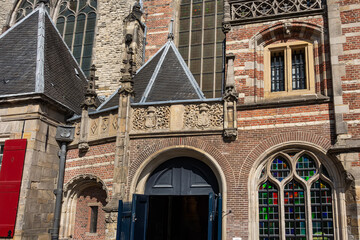 Amsterdam Old Church (Oude Kerk), oldest parish church, founded in 1213. Oude Kerk stands in Amsterdam De Wallen district on Old Church's Square (Oudekerksplein). Amsterdam, The Netherlands.