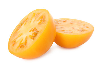 Pieces of ripe yellow tomato isolated on white
