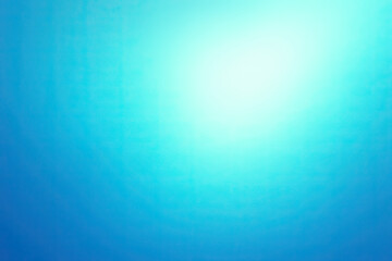 Obraz premium Serene abstract background with a radiant aqua to deep blue gradient, featuring a bright, ethereal glow from the upper right corner, creating a tranquil and smooth textured visual for various design p