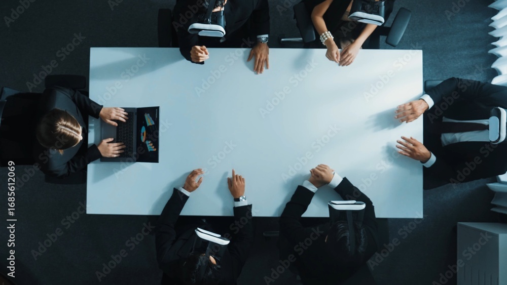 Poster top down aerial view of professional business team wear vr headset to enter virtual world while sitt