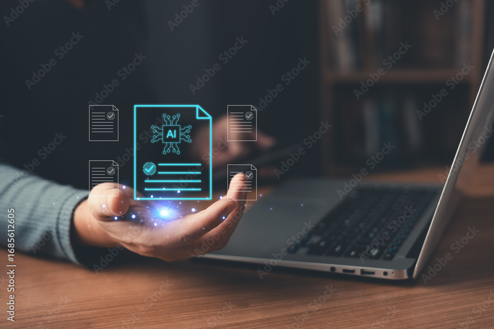 Poster person holds glowing ai-powered digital documents while using a laptop, symbolizing artificial intel