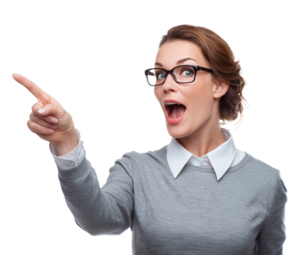 A surprised woman points with excitement, wearing glasses and a gray sweater.
