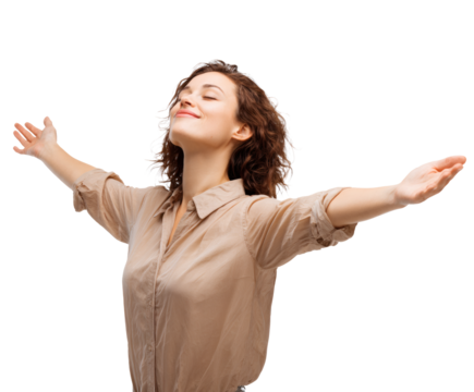 Joyful woman with arms open, experiencing a moment of freedom and peace.
