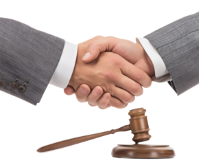 Handshake over a gavel, symbolizing agreement and justice.