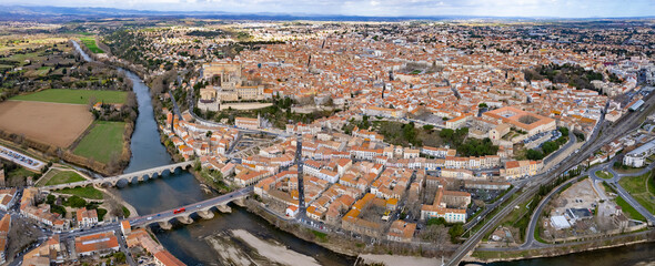 An aerial panorama view around the old town in the city Béziers in France on a sunny day in early spring