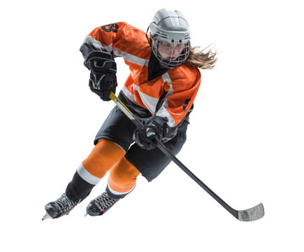 Female hockey player in action on ice.