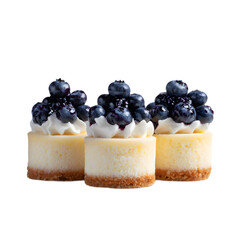 Mini Cheesecakes Topped with Blueberries isolated on a transparent background.